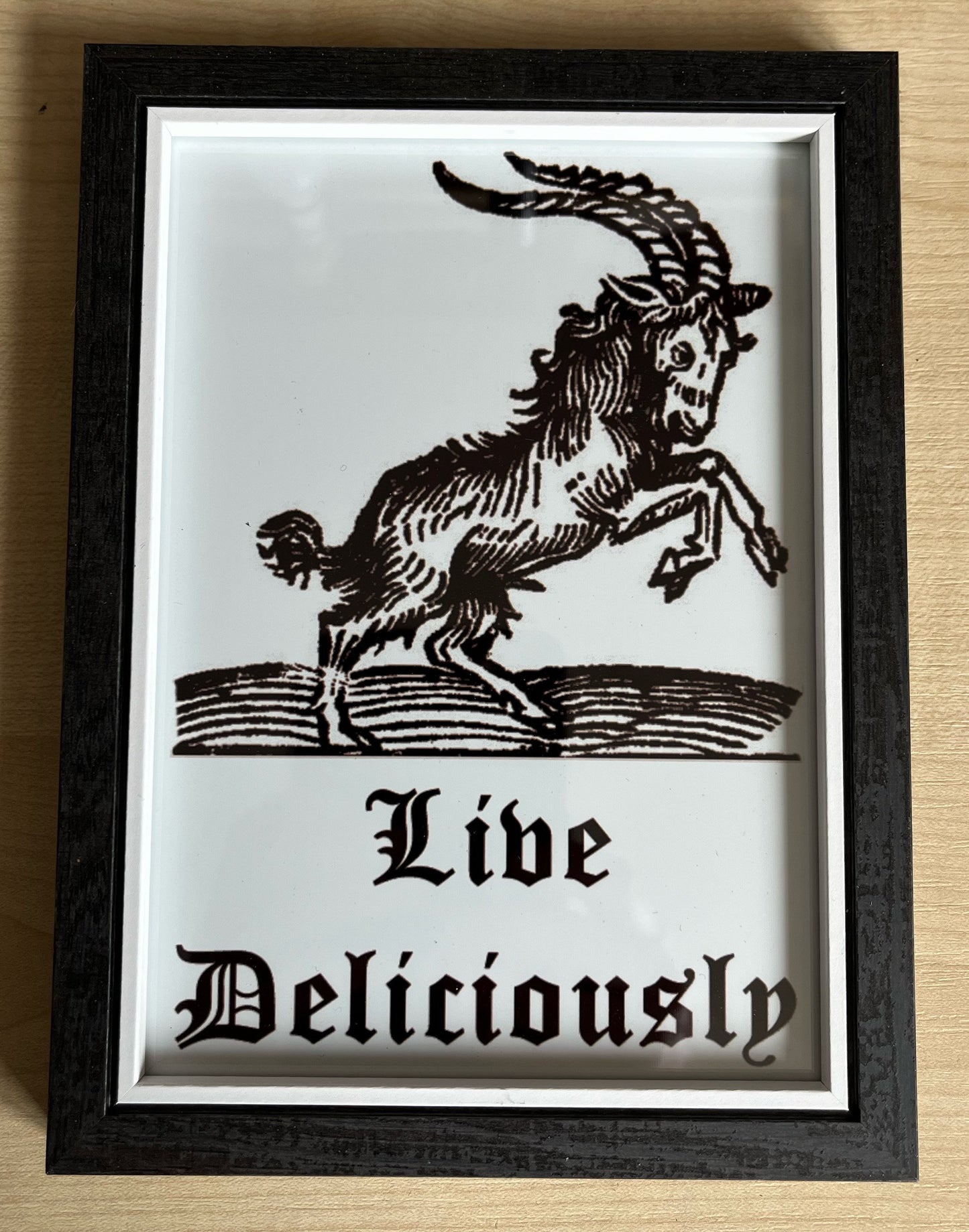 Black Phillip Framed Print