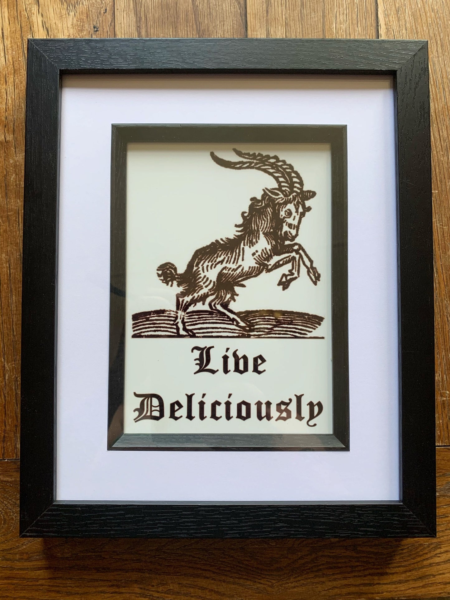 Black Phillip Framed Print