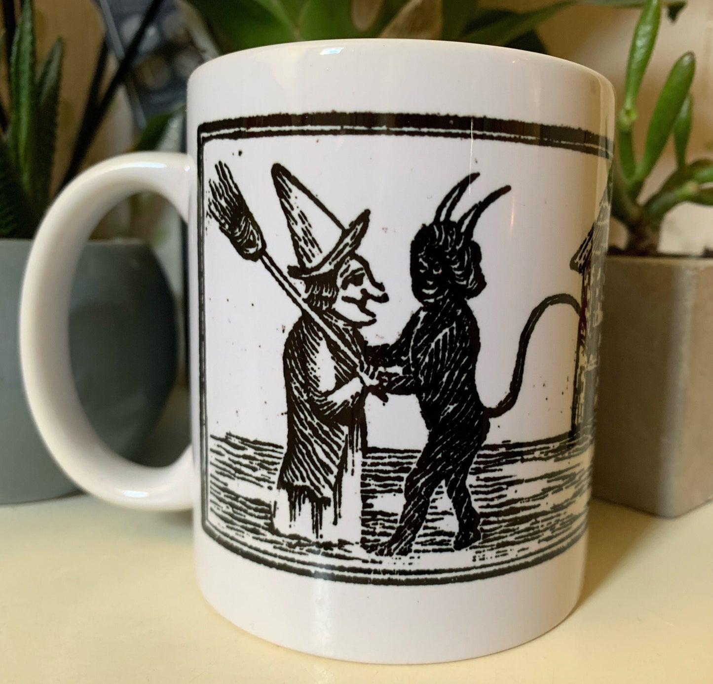 Devil Hugging Witch Mug