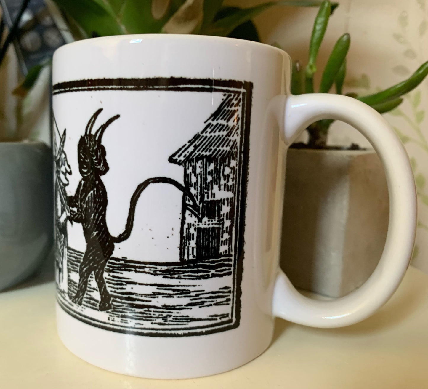 Devil Hugging Witch Mug