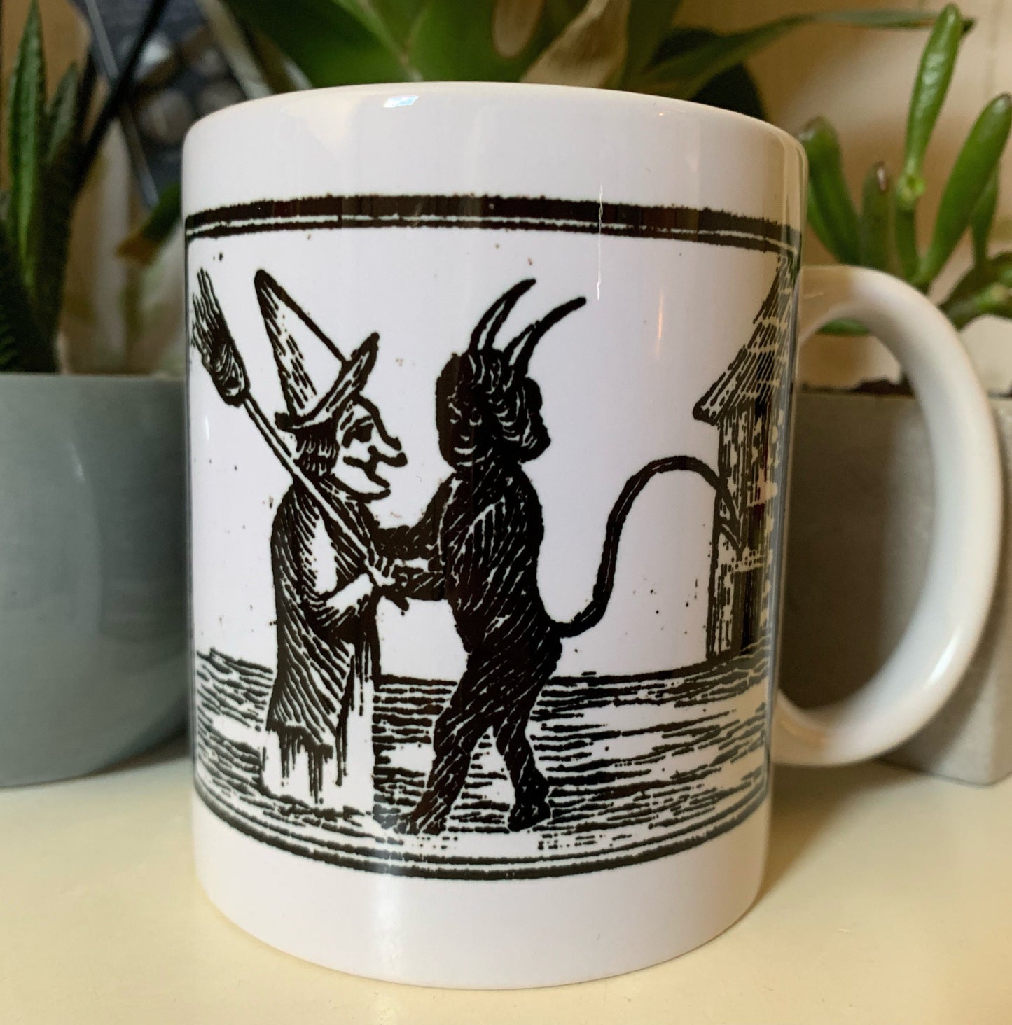 Devil Hugging Witch Mug