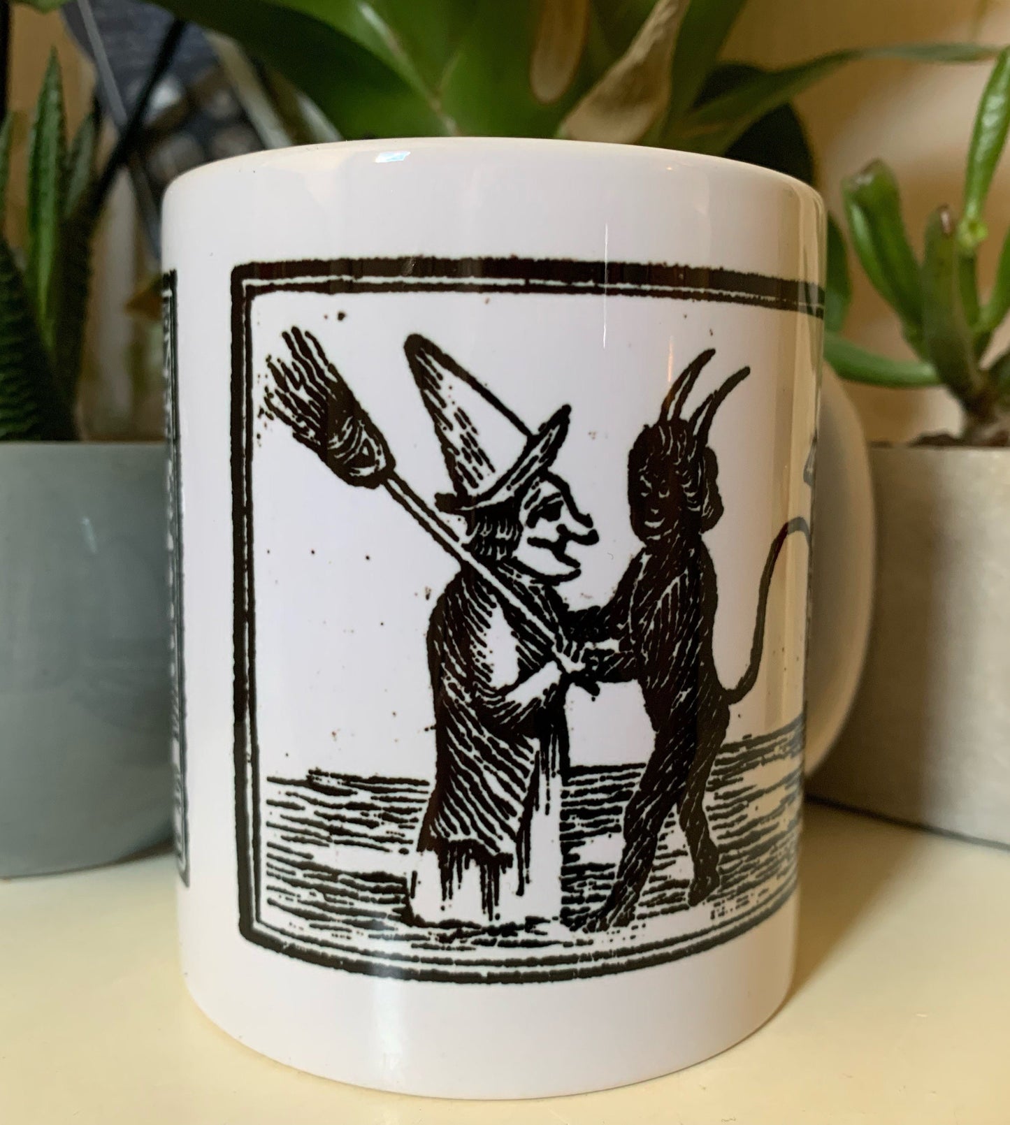 Devil Hugging Witch Mug