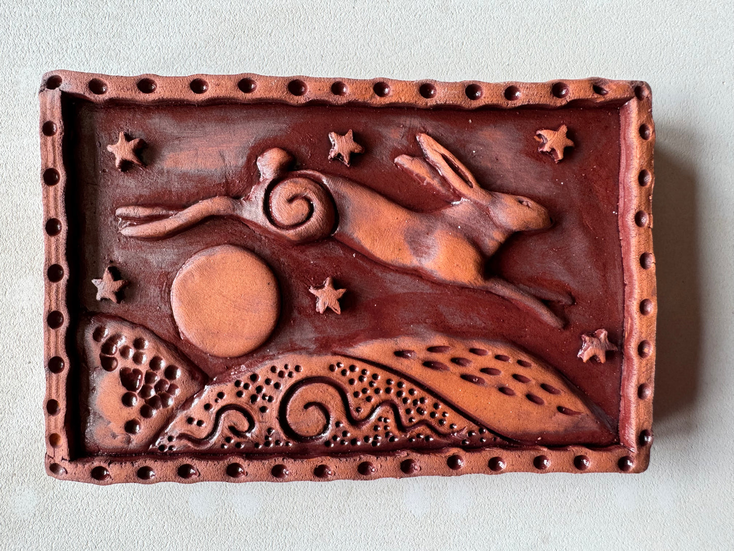 Terracotta Leaping Hare Wall Plaque with oxides