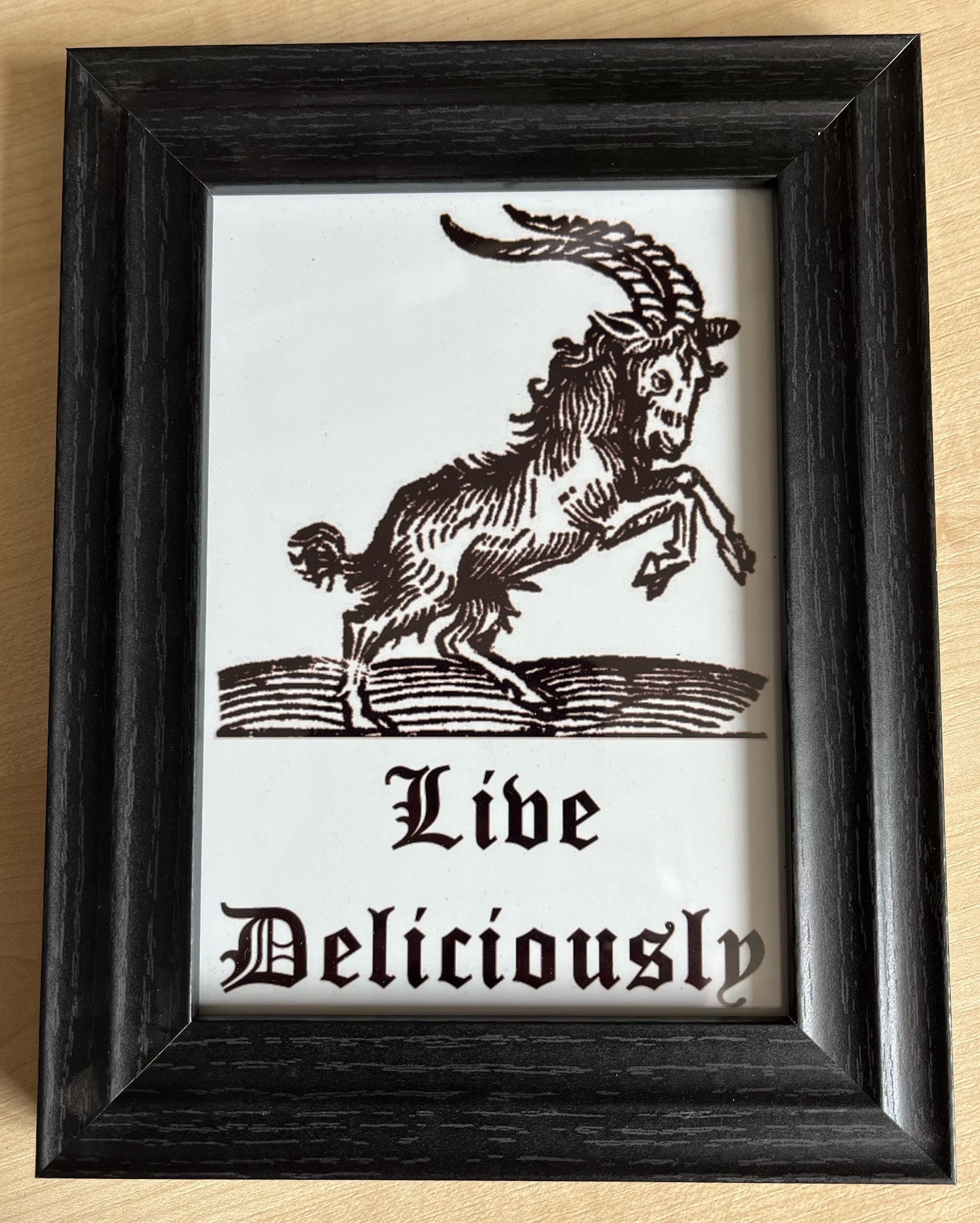 Black Phillip Framed Print
